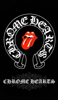 the rolling stones logo on a black shirt with white writing and red lips, in front of