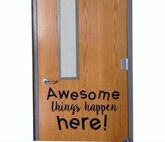 a wooden door with the words awesome things happen here on it and an open window