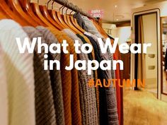 a man standing in front of a rack of clothes with the words what to wear in japan written on it