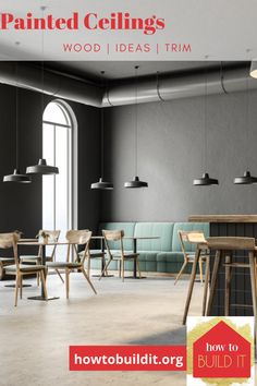 an empty restaurant with tables and stools in front of the window, along with several lights hanging from the ceiling