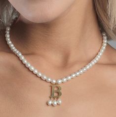 💎 Wear the Anne Boleyn Necklace with the first letter of your name. 💎 You will feel the quality of the necklace with the freshwater pearl. Both letter and pearl necklace. 💎 It is also great for gifting to your loved ones. We send it in gift wrapping. 💎 The elegance you seek. The first letter of your name is specially designed for you. 💎 Our pearls are premium quality freshwater pearls. Your initial letter is prepared with 925 sterling silver and your necklace is prepared with a freshwater p Elegant Letter Bead Jewelry, Elegant Necklace With Letter Beads For Personalized Gift, Elegant Letter Beads Necklace For Personalized Gift, Elegant Initial Necklace With Letter Beads For Personalized Gift, Elegant Name Necklace With Letter Beads For Anniversary, Personalized Pearl Necklaces With Initial Pendant, Personalized Pearl Necklace With Initial Pendant As Gift, Elegant Letter Beads Name Necklace For Personalized Gift, Personalized Initial Pendant Pearl Necklaces