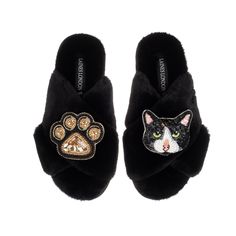 Introducing our Classic Laines Slippers with a charming twist - a pair of elegant cat brooches! These comfortable and stylish slippers are designed in house in the United Kingdom and brought to life by our skilled artisan craftspeople.   The soft and luxurious material will keep your feet cozy and warm, while the adorable and removable cat mum/mom and Misty cat brooches add a playful touch to your loungewear.  Perfect for cat lovers, these slippers are the purrfect blend of comfort and charm. Treat yourself or a loved one to these delightful Classic Laines Slippers with Cat Mum/Mom & Misty Cat Brooches. Wipe Clean Only