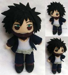 an image of a stuffed doll with black hair