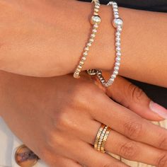 elevate your ring stack with our Sunset Lover Ring Stack. this premium set creates endless possibilities to elevate your jewelry capsule collection. wear each band individually or stack them together for a touch of luxury. the perfect addition for a sophisticated and minimal look. 18K gold pvd over 316L stainless steel water & tarnish resistant each band is 2mm thick set of 3 bands 1 cz bezel band, 2 solid bands Jewelry Capsule, Bezel Band, Minimal Look, Ring Stack, Sunset Lover, Capsule Collection, Steel Water, Stacking Rings, Endless Possibilities