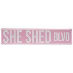 a pink sticker that says she shed blvd