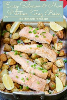 salmon and potatoes in a pan with lemon wedges