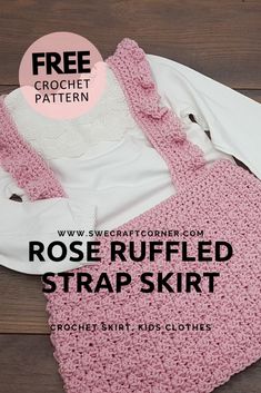 a pink crocheted bag sitting on top of a wooden floor next to a white shirt