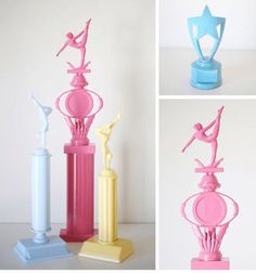 three different colored vases with statues on them and one is pink, blue, yellow, and white