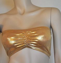 This fabulous cinched front tube top is a HIGH quality product. It is fashionable, with a flattering and FUNCTIONAL fit! It is designed to provide a medium level of support for an yoga/active wear top. Wear it as a tank, shirt, bikini, and bra too. It is great for layering under tops, and dresses.FABRIC:* High performance metallic swimwear knit, Polyester & Spandex* Fabric is double layer and medium thickness.FIT:* Sports bra style fit-Medium support* XS/S ( fits misses 0-2) Top is 6.25 in. from Gold Tube Top, Camo Bridesmaid Dresses, Metallic Swimwear, Metal Bra, Camo Wedding, Bra Items, Camo Dress, Plus Size Workout, Womens Sports