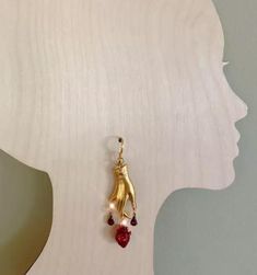 ♡ Coronary Heart Blood Tear Earrings ♡ Blood Jewels Dripping Anatomical Heart Earrings. These "Love Hurts Dainty Dangle Earrings" Are A Crazy Elegant Way To Express Your Love And Makes Your Look Truly Standout! ▂▂▂▂▂▂▂▂▂▂▂▂▂▂▂▂▂▂▂▂▂▂▂▂▂▂▂ 💖 Material: 925 Sterling Silver, 18K Gold And Natural Garnet Stone ✅ 💖 Weight: 0.2 Oz (for a pair of earrings) 💖 Everything we do is custom made by hand with Love and Care in our Texan Workshop ♡✅ ▂▂▂▂▂▂▂▂▂▂▂▂▂▂▂▂▂▂▂▂▂▂▂▂▂▂▂ ❏ Why Buy This Unique Handmade Ea Valentine's Day Gift Dangle Clip-on Earrings, Dangle Clip-on Earrings For Valentine's Day Gift, Heart-shaped Dangle Earrings For Party, Dangle Heart Earrings For Party, Single Dangle Earring For Valentine's Day, Nickel-free Heart Drop Earrings For Party, Party Heart Drop Earrings With Ear Wire, Blood Earrings, Blood Tears