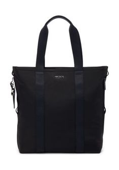 This medium-sized tote is designed to be embroidered for a personalized look. It features signature Bravo details like TUMI+ compatibility and an Add-a-Bag strap. | TUMI Alpha Bravo Essential Tote Bag, Black Tote Bag Black, Travel Tote, Bag Straps, Travel Luggage, Medium Size, Tote Bag, Travel, Black