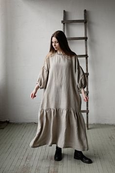 This oversized dress is made from 100% soft and washed linen. Details: - Composition: 100% Oeko-Tex certified linen - Colour: natural - Dropped shoulders - Linen belt - Ruffle skirt and neckline - Size: One size - fits all - Medium weight linen - Linen care: machine wash gentle; tumble dry low, ironing optional - The price is for one dress, other pictured items are not included Measurements: Length (from neck down) - 125 cm (49,2 in) Chest width - 140 cm (55,1 in) Sleeve length (from collar) - 6 Oversized Beige Lagenlook Dress, Lagenlook Linen Maxi Dress With Relaxed Fit, Linen Lagenlook Maxi Dress With Relaxed Fit, Oversized Linen Lagenlook Dress, Oversized Beige Linen Dress, Oversized Linen Dresses For Daywear, Plus Size Linen Dress, Pink Linen Dress, Kimono Style Dress