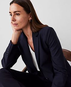 Elevate your professional wardrobe with the Ann Taylor Petite Notched One Button Blazer in Seasonless Stretch. This impeccably tailored piece is a must-have for year-round sophistication.

- **Size:** Petite 10
- **Color:** Deep Navy Sky
- **Material:** Shell: 68% Polyester, 29% Viscose, 3% Spandex; Body Lining: 100% Polyester; Sleeve Lining: 95% Polyester, 5% Spandex
- **Fit:** Tailored fit
- **Length:** Hits at hip, approximately 22" long
- **Features:** Notched lapel, one-button front, long b Long Blazer Jacket, Ann Taylor Petite, One Button Blazer, Women's Blazers, Professional Wardrobe, Sky Color, Open Sleeve, Navy Suit, Long Blazer