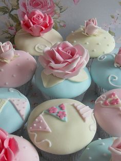 cupcakes decorated with pink and blue frosting