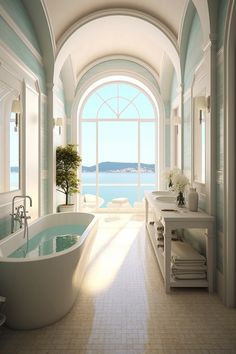 a large white bath tub sitting inside of a bathroom next to a sink and window