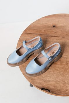 Lola Mary Jane flats with an almond toe are crafted from smooth blue Italian leather with beige outsole. Women's oxford flats are completely handmade and will perfectly complement any look. Use it as everyday cute flat shoes, or for a gift. Memory insoles along the entire length of the shoe, are soft and remember the position of the foot. Tunit sole is a mixture of leather chips and rubber, it's more wear-resistant than leather and more durable. Also, we use soft natural upper materials that wea Blue Leather Flats, Blue Mary, Ballet Shoe, Womens Mary Janes, Cute Flats, Oxford Flats, Shoe Company, Womens Wedding Shoes, Mary Jane Flats