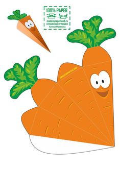 a cut out of a carrot with a face and two green leaves on the top