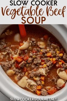 slow cooker vegetable beef soup in a white crock pot with text overlay