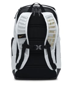 Take your hoops game to the next level. Plenty of storage helps keep your gear organized, from its spacious main compartment to the zippered pockets that store your small essentials. What makes it a slam dunk? A chest strap combined with air units for cushioning on the shoulder straps that provide extra comfort, so it's here to game all day. Shown: White/Black/Metallic Gold Style: DX9786-100 Nike Hoops Elite Backpack, Nike Backpack Aesthetic, Nike Elite Bag, Black Nike Backpack, Nike Elite Backpack, Bball Shoes, Hoop Games, Elite Backpack, Sport Essentials