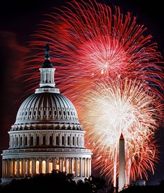 fireworks light up the night sky over the capital building