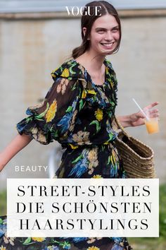 a woman in a floral dress holding a straw bag and smiling with the words, beauty street - style die schonsten ha