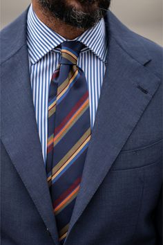 Experience a touch of timeless sophistication with our timeless grosgrain weave striped tie. 100% Made in Como, Italy. Extra Long Length: Approx. 3.38" x 62.5". A classic tie width and length that is perfect for most men taller than 6'2". 100% silk jacquard: It is made on a special jacquard loom, using different colored yarn-dyed threads to create the woven pattern. 3-fold construction: This ensures your tie maintains its shape and effortlessly creates a flawless knot for a truly distinguished l Classic Suit And Tie Accessories With Vertical Stripes, Classic Striped Tie For Black Tie Occasions, Classic Striped Tie For Black Tie Events, Classic Striped Suit And Tie Accessories For Business, Classic Pinstripe Ties For Formal Occasions, Elegant Formal Suit And Tie Accessories With Vertical Stripes, Elegant Striped Suit Accessories For Workwear, Navy Suit And Tie Accessories For Business, Elegant Striped Ties For Work