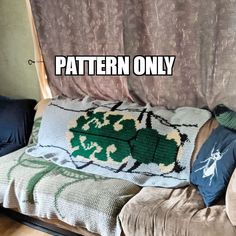 a couch with some pillows on it and the words pattern only written in large letters