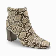 Introducing the Bella Vita Wilma – a fashionable ankle bootie featuring a chic snake print design atop a sturdy block heel. Perfect for adding a fashion statement to any look. Features: - Snake Print Design- Square Toe- Zipper Closure- Heel Type: Block- Heel Height: 2.5"- Shaft Height: 4.5" Fall Snake Print Ankle Boots, Snake Print Heeled Boots With Round Toe For Fall, Fall Round Toe Heeled Boots With Snake Print, Fall Snake Print Round Toe Heeled Boots, Fall Snake Print Heeled Boots With Round Toe, Fall Season Snake Print Heeled Boots With Round Toe, High Heel Snake Print Boots For Fall, Snake Print High Heel Boots For Fall, Chic Snake Print Boots With Block Heel