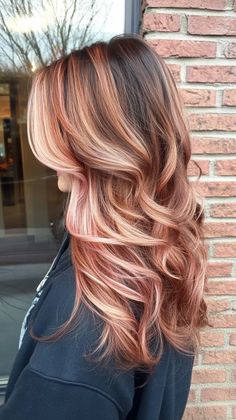 Create a stunning look with a peachy pink ombre that beautifully complements tan skin. Visit our page for tips on achieving this gradient effect. Save this pin for ombre inspiration! Tags: #PeachyPinkOmbre #HairColor #TanSkin Raspberry Sundae Hair, Red Hair Dye Ideas For Dirty Blonde, Blonde With Red Tips, Copper And Pink Hair, Pink And Blonde Highlights, Blonde Hair Color Ideas For Fall Winter Balayage, New Fall Hair Colors, Strawberry Blonde Ombre, Highlights Subtle