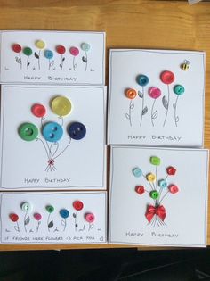 four birthday cards with buttons and flowers on them