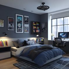 a bedroom with a bed, desk and computer on the wall in front of a large window