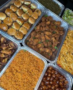 trays filled with different types of food including burgers, sides and other foods