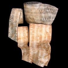 three pieces of paper with musical notes on them