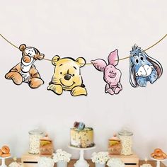 winnie the pooh and friends hanging on a line