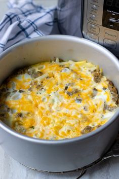 instant pot sausage egg casserole with an instant pressure cooker in the background