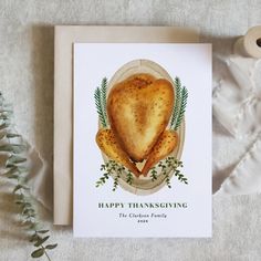 a thanksgiving card with a heart shaped turkey on it next to a sprig of greenery