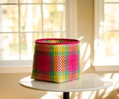 Add a dash of color, pattern & texture to your home organization with our range of Kottan baskets. Kottans are handwoven palm leaf baskets made in the Chettinadu region of Tamil Nadu, India. It was an integral part of every household, widely used for religious ceremonies, gift giving & daily storage. Once practiced as the leisurely activity of the women from affluent families, the art of weaving the kottan baskets nearly went out of practice until it was slowly revived in the early 2000s. The ar Basket In Kitchen, Maximalist Bohemian, Handmade Tale, Palm Leaf Baskets, Tall Basket, Colorful Baskets, Religious Ceremony, Maximalist Decor, Bohemian Interior