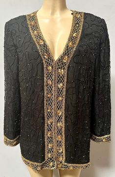 This beaded coat is handmade, high quality, original design and beautiful. This top is suitable for party, events or any occasional use. Elegant Embellished Festive Outerwear, Festive Embroidered Outerwear For Party, Festive Embroidered Party Outerwear, Winter Party Embellished Outerwear, Elegant Hand Embellished Long Sleeve Outerwear, Elegant Long Sleeve Hand Embellished Outerwear, Elegant Silk Outerwear For Festive Occasions, Elegant Fitted Outerwear For Festive Occasions, Elegant Festive Evening Outerwear