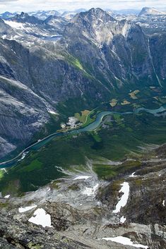 an aerial view of the mountains and rivers