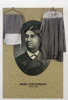 an image of a man's clothes hanging on a wall with the words niko firosmani above it