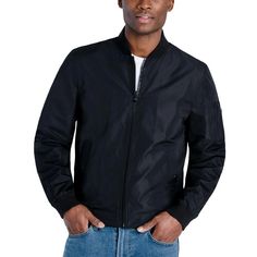 This classic bomber jacket from Michael Kors is perfect for stylish Instagrammers. Featuring a water-resistant shell and zip closure, it keeps you dry without compromising looks. Subtle touches like ribbed collar, snap pockets and signature logo badge complete the authentic aviator style. With cozy knit cuffs and waist trim, you'll want to lounge and lounge in its versatile charcoal or navy hue all season long. Casual Michael Kors Outerwear With Pockets, Casual Michael Kors Outerwear, Michael Kors Casual Spring Outerwear, Casual Michael Kors Outerwear For Work, Casual Michael Kors Outerwear For Fall, Michael Kors Men, Logo Badge, Aviator Style, Cozy Knit