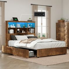 a bed sitting in a bedroom next to a dresser with drawers on it's sides