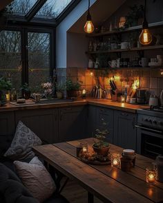 a kitchen filled with lots of lights next to a wooden table and counter top in front of a window