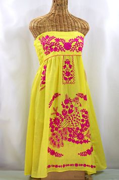 "Our embroidered \"La Canaria Sundress\" peasant dress features ornate flowers and a bird artfully embroidered by hand. Made of light and airy 100% cotton fabric, the \"La Canaria\" dress features a bandeau style and smocked back and is perfect for hot summer days. This particular Canaria is YELLOW with MAGENTA PINK embroidery. It is unlined and semi-sheer. Each dress is a hand embroidered, one-of-a-kind work of art. CARE: Hand or machine wash cool on gentle cycle with like colors. Hang to dry o Peasant Dress Patterns, Strapless Sundress, Pink Embroidery, Floral Embroidery Patterns, Take Home Outfit, Embroidery Cotton, Bohemian Look, Magenta Pink, Peasant Dress