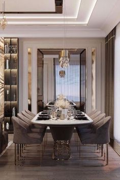 a dining room table with chairs and a chandelier hanging from the ceiling