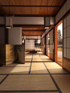 an empty room with tata mats on the floor and wooden doors leading to another room