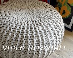 an ottoman made out of woven material with the word pattern overlayed on it