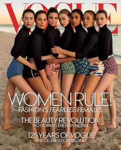 four women in swimsuits on the cover of a magazine with their arms around each other