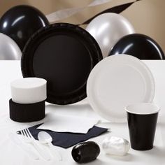 black and white dinnerware on a table