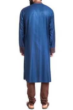 Shop for Poonam Kasera Blue Muga Dupion Embroidered Kurta And Churidar for Men Online at Aza Fashions Designer Blue Kurta With Embroidered Sleeves, Blue Straight Kurta With Embroidered Sleeves, Traditional Blue Kurta With Embroidered Sleeves, Blue Straight Kurta With Embroidered Border, Eid Fitted Kurta With Embroidered Cuffs, Traditional Wear Embroidered Straight Kurta For Eid, Traditional Kurta With Embroidered Sleeves For Eid, Eid Embroidered Straight Kurta, Traditional Blue Sets With Embroidered Sleeves